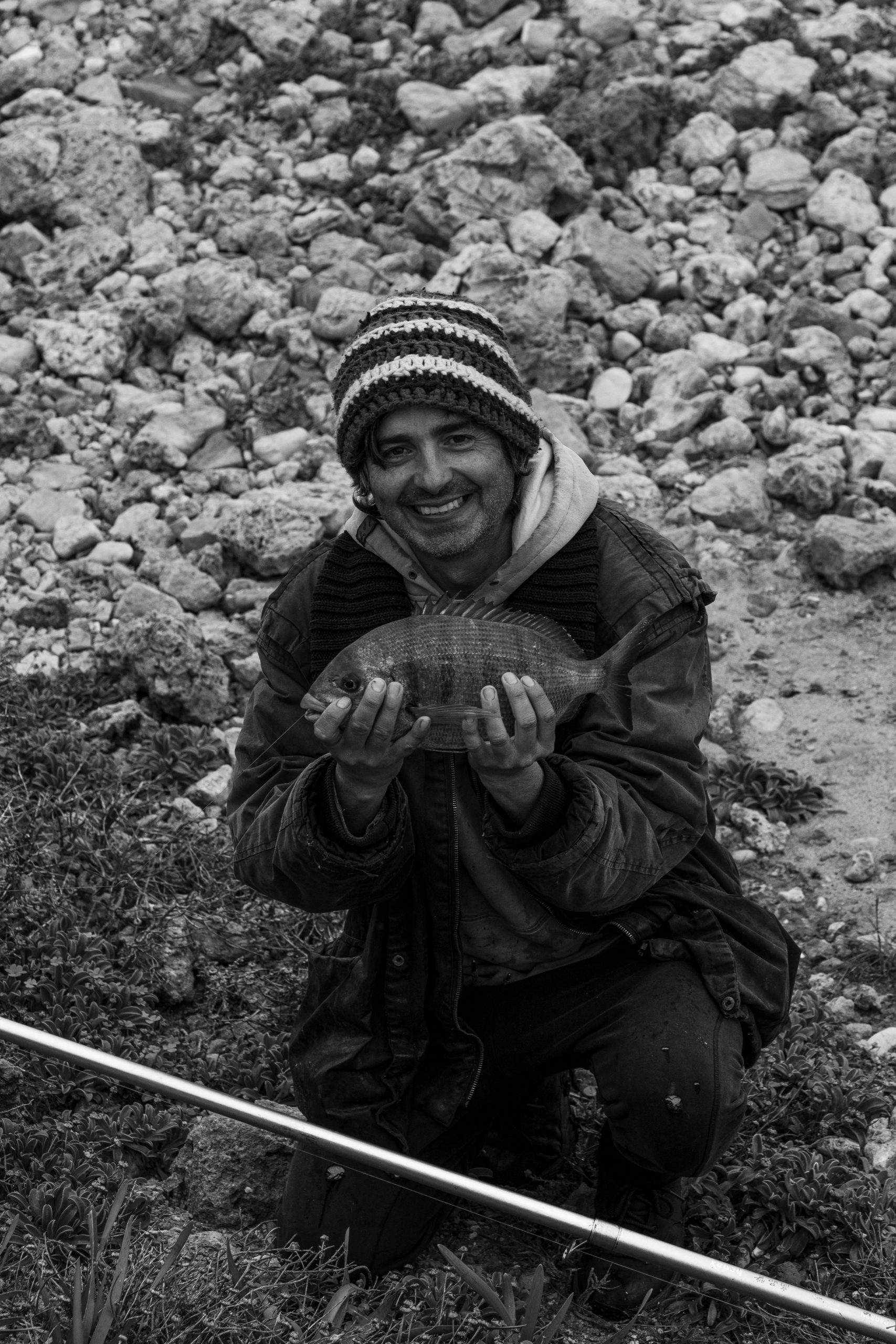 Fisher with the fish he caught