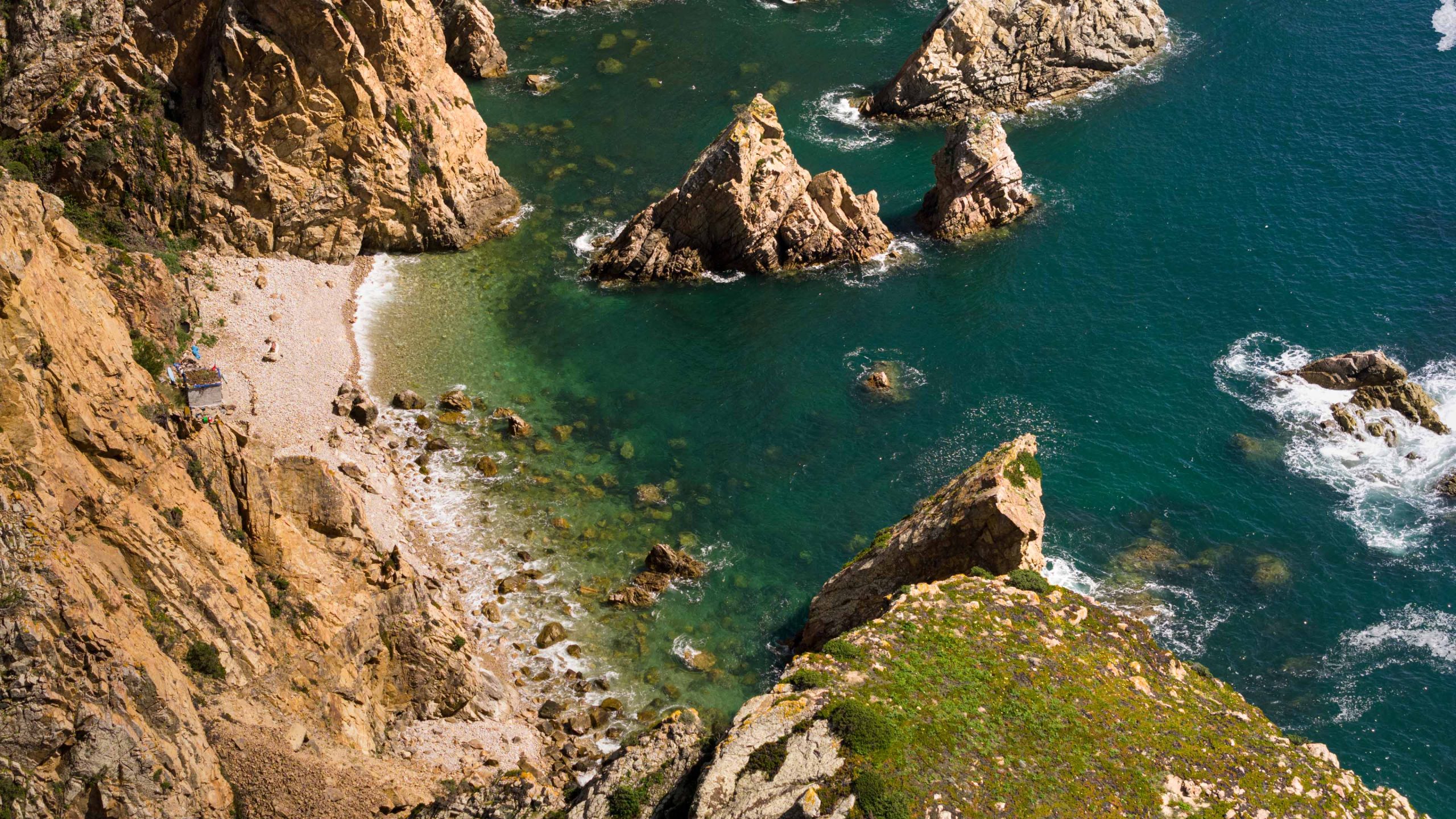 View from the top onto a small beach